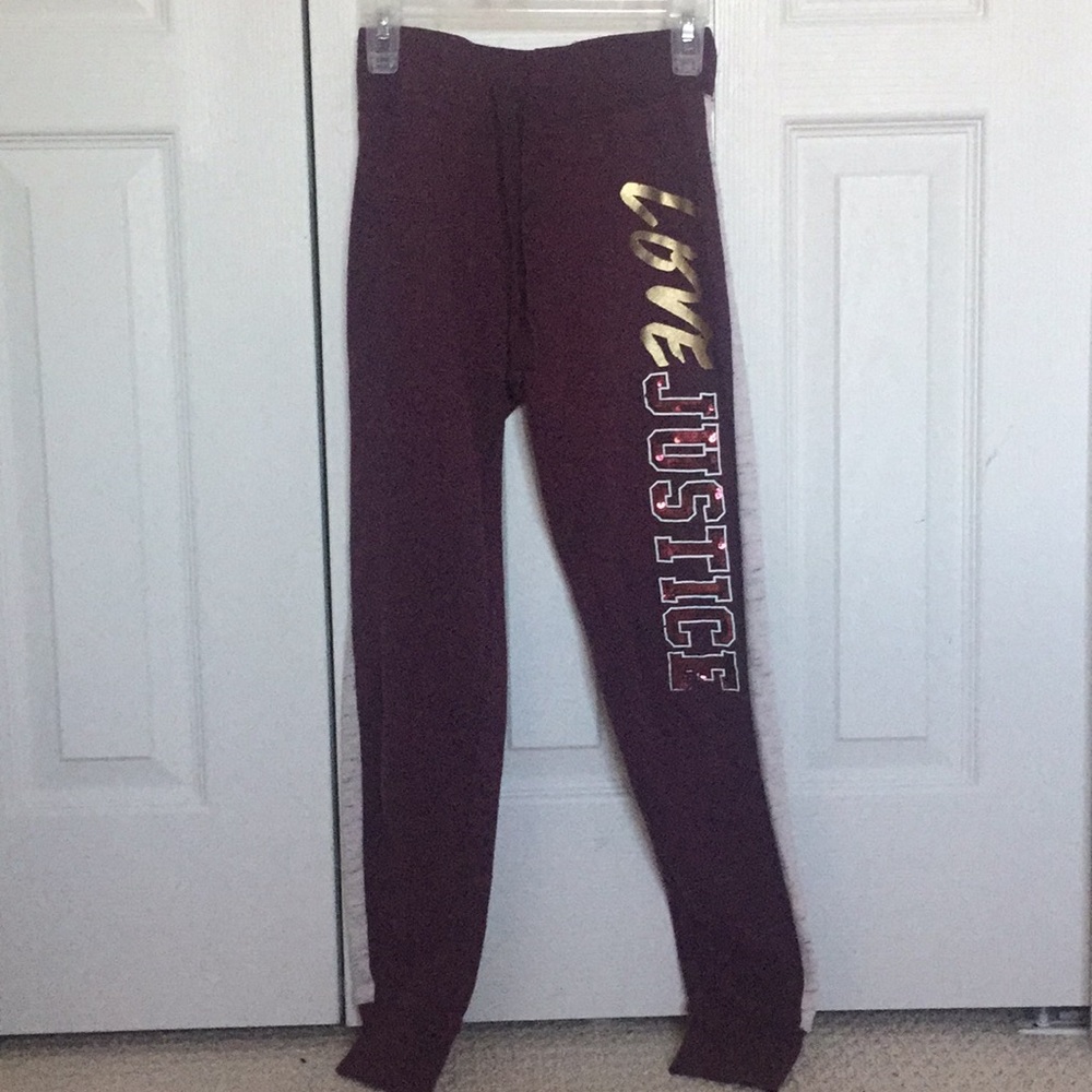 Maroon purple sweatpants with strips